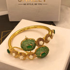 Luxury Gold Plated Handcuff with Green Stones & Pearl Detailing for Girls/Women